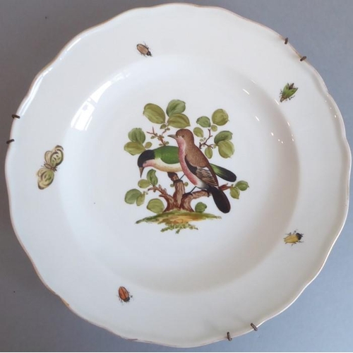 45 - A long and rare set of 36 late 19th century Meissen porcelain dishes; each with shaped gilded border... 