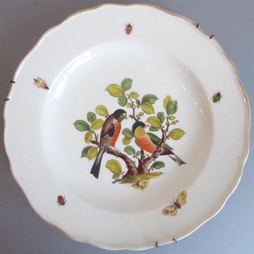 45 - A long and rare set of 36 late 19th century Meissen porcelain dishes; each with shaped gilded border... 