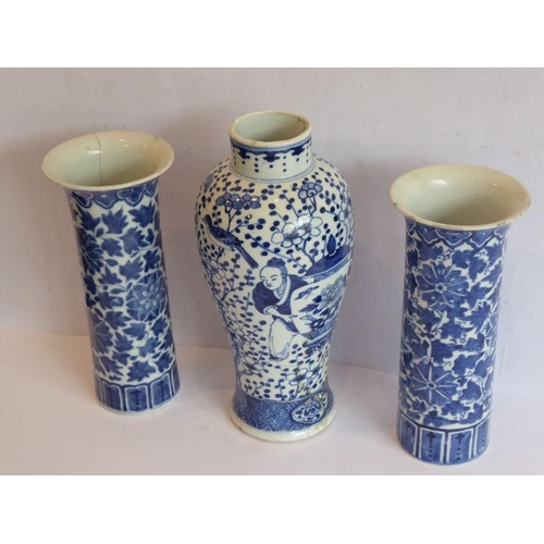 47 - A pair of 19th century Chinese porcelain sleeve vases in Kangxi style; decorated in underglaze blue,... 