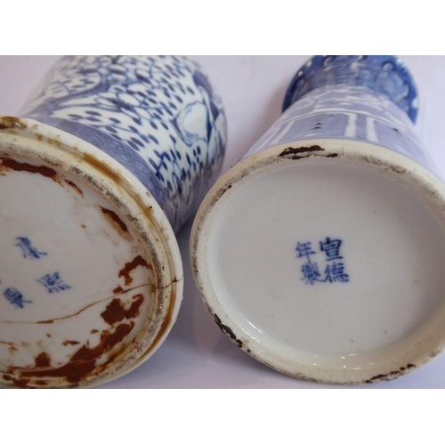 47 - A pair of 19th century Chinese porcelain sleeve vases in Kangxi style; decorated in underglaze blue,... 