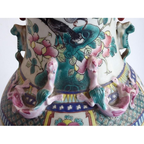 51 - A large mid-19th century Chinese porcelain vase of baluster form; the flaring neck above a multi-col... 