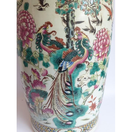 51 - A large mid-19th century Chinese porcelain vase of baluster form; the flaring neck above a multi-col... 