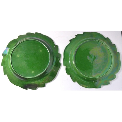 53 - A set of four finely moulded green leaf ceramic dishes, together with one other similar example with... 