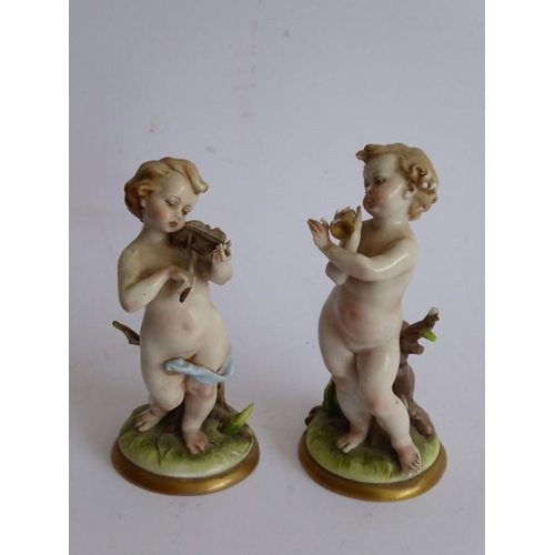 54 - Six porcelain figures: two 19th century Staffordshire examples, a pair of Naples porcelain musicians... 