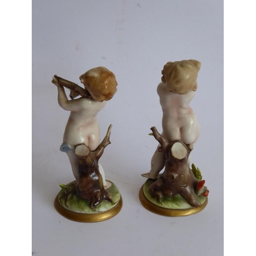 54 - Six porcelain figures: two 19th century Staffordshire examples, a pair of Naples porcelain musicians... 