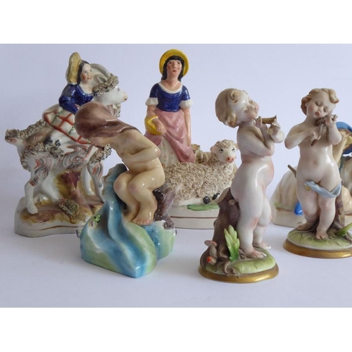 54 - Six porcelain figures: two 19th century Staffordshire examples, a pair of Naples porcelain musicians... 