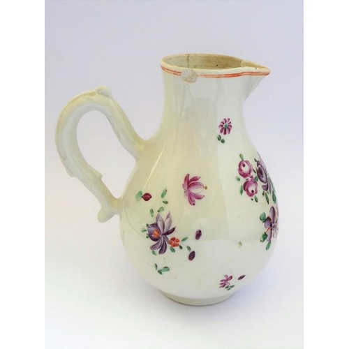 56 - A large late 18th century Chinese export porcelain tankard; decorated in the famille rose palette wi... 