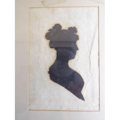 568 - Two early 19th century painted silhouettes: Marie Louise and Napoleon Bonaparte opposing, and a clip... 