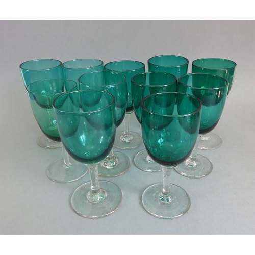 72 - Eleven 19th century green glass wines, together with five cranberry glass-style tapering beakers and... 