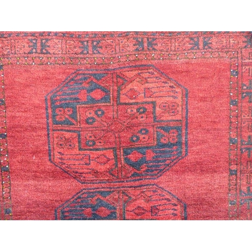 733 - An Afghan rug; circa 1900, north Afghanistan (213cm (7'0