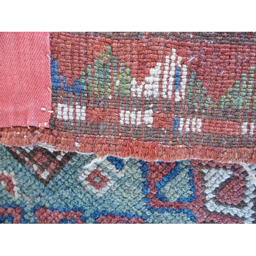 737 - South-west Caucasus, a Kazak rug; circa 1900, three and a half lozenges against a blue field within ... 