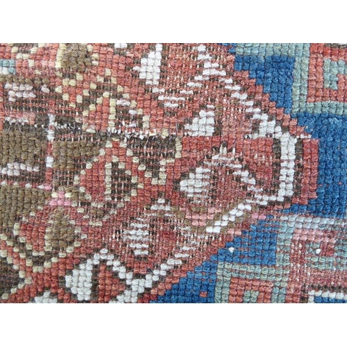 737 - South-west Caucasus, a Kazak rug; circa 1900, three and a half lozenges against a blue field within ... 