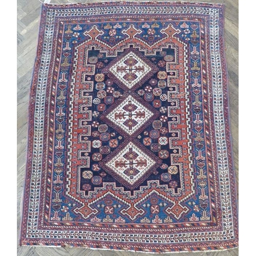 739 - A south Persia Afshar; circa 1900, triple medallion against an indigo-blue ground (147cm x 115cm)