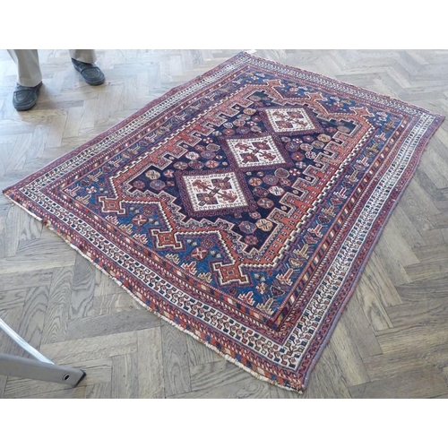 739 - A south Persia Afshar; circa 1900, triple medallion against an indigo-blue ground (147cm x 115cm)