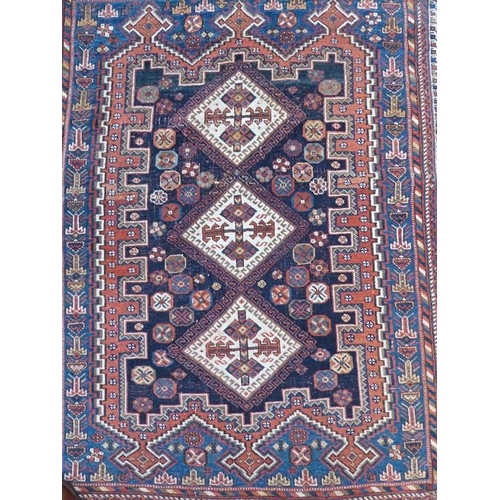 739 - A south Persia Afshar; circa 1900, triple medallion against an indigo-blue ground (147cm x 115cm)