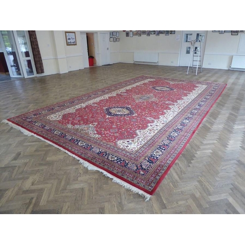 744 - A large and exceptional north-west Persia carpet (signed to one end); central four-point multicolour... 