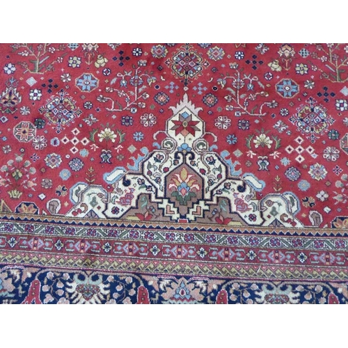 744 - A large and exceptional north-west Persia carpet (signed to one end); central four-point multicolour... 