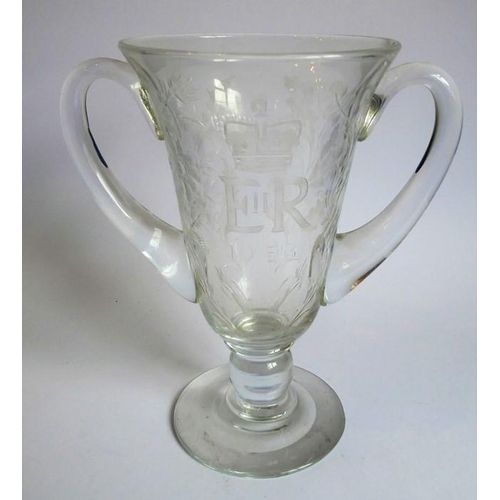 75 - A pair of mid-20th century two-handled clear-glass vases foliates engraved and with the cypher of El... 