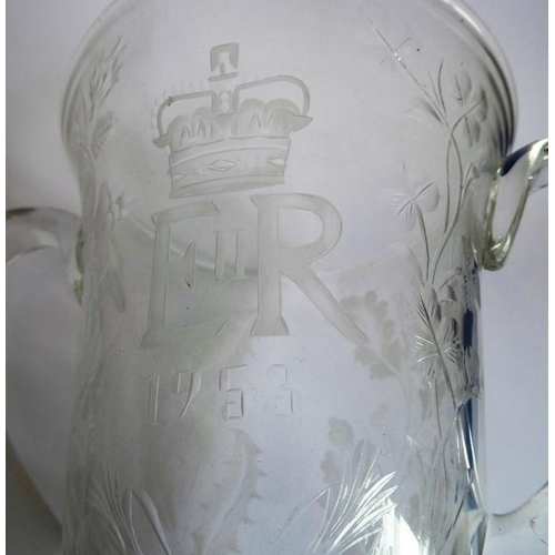 75 - A pair of mid-20th century two-handled clear-glass vases foliates engraved and with the cypher of El... 