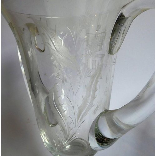 75 - A pair of mid-20th century two-handled clear-glass vases foliates engraved and with the cypher of El... 