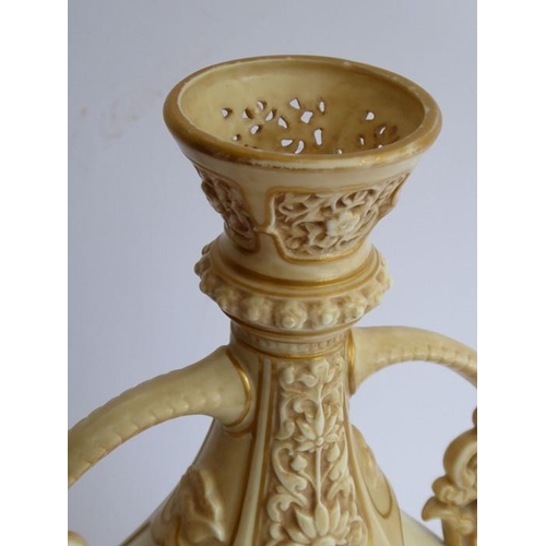 8 - A late 19th century Worcester blush porcelain vase; flaring reticulated top above two ornate handles... 