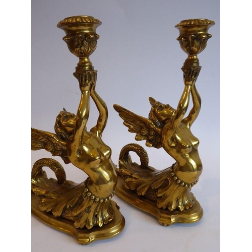 92 - A fine pair of heavy early/mid-19th century lacquered gilt-bronze figural candlesticks; two winged f... 