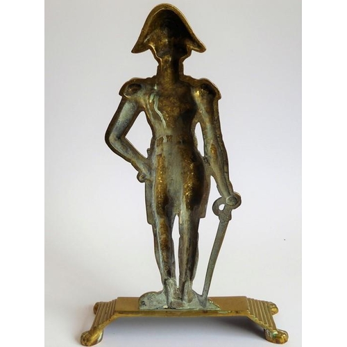 95 - A late 19th/early 20th century brass doorstop modelled as The Duke of Wellington in full regalia and... 