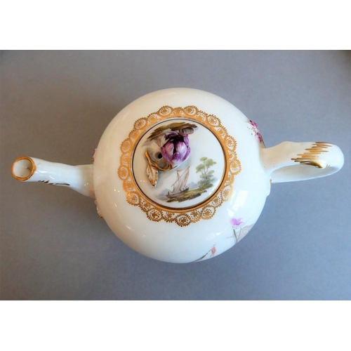 1 - A 19th century Meissen porcelain cabaret set: a two-handled tray, bullet-shaped teapot, coffee pot, ... 