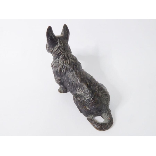 100 - A well modelled and heavy patinated bronze model of a seated Scottie dog (approx. 368g, 9.75cm long ... 