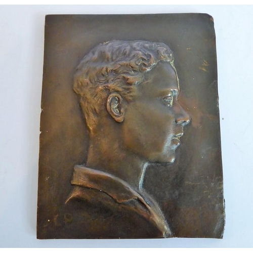 102 - A pair of late 19th/early 20th century patinated bronze shoulder-length portrait studies in relief; ... 