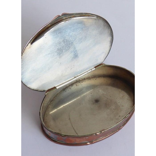 114 - A 19th century oval copper (once silver plated) table snuff box; the lid inset with a worn early 19t... 