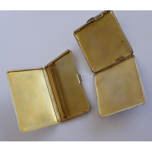 117 - Two heavy early 20th century hallmarked silver cigarette cases: each with Birmingham assay marks and... 