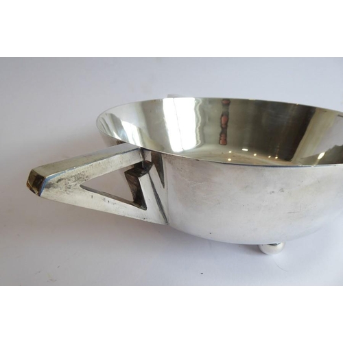 119 - A highly stylised heavy Art Deco style/period silver-plated three-handled bowl of cylindrical form, ... 