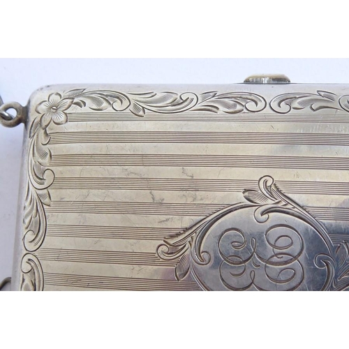 120 - A late 19th century silver aide-mémoire dress purse on chain; the central cartouche engraved with a ... 