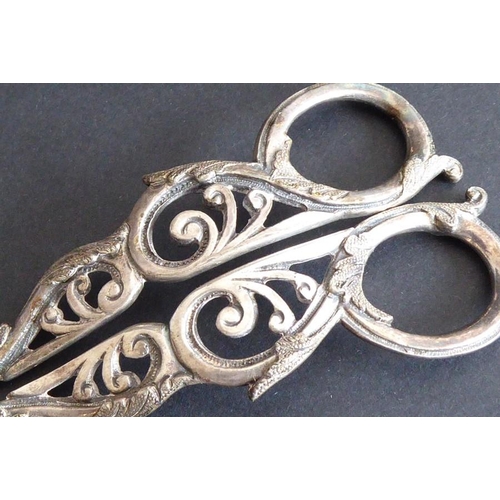 127 - A pair of 19th century silver-plated grape scissors, ornately pierced with anthemion-style motifs (c... 