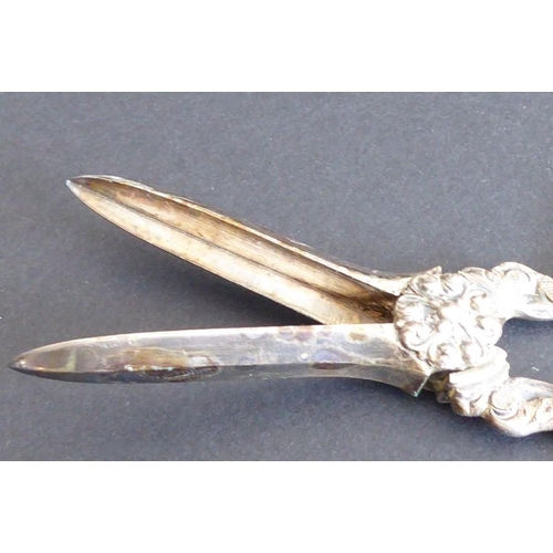 127 - A pair of 19th century silver-plated grape scissors, ornately pierced with anthemion-style motifs (c... 