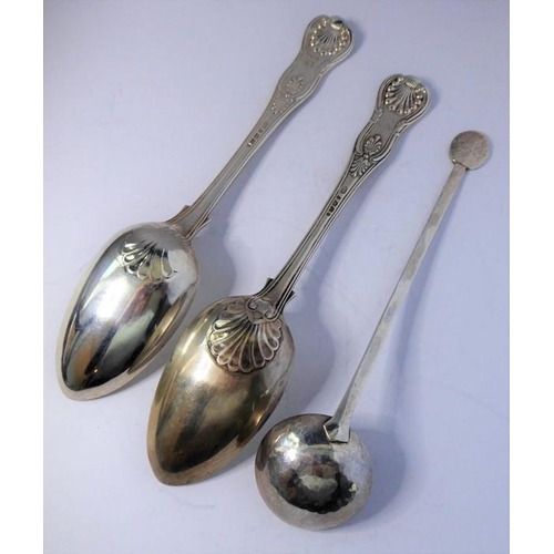 133 - A pair of heavy mid 19th century hallmarked silver serving spoons; double-struck in the King's patte... 