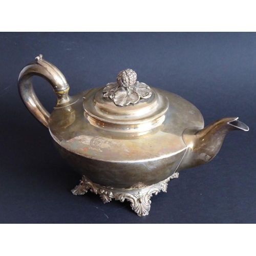 138 - A hallmarked silver teapot with a budding flower as the finial; of squat form, maker's mark RP GB, a... 