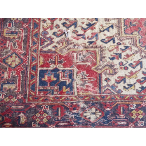 723 - A Heriz carpet; early 20th century, north-west Iran (305cm (10'0