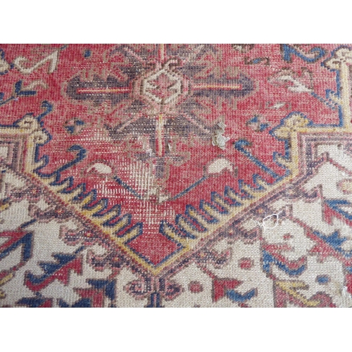 723 - A Heriz carpet; early 20th century, north-west Iran (305cm (10'0