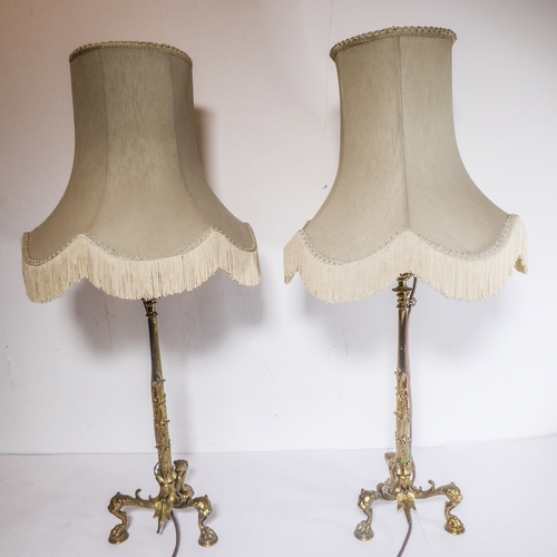 70 - A fine, large and heavy, pair of 19th century gilt-metal candlesticks (now adapted and as table lamp... 