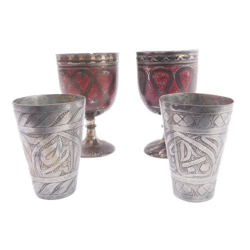 79 - A pair of Safavid-style heavy goblets; enamelled and decorated with a central band of inverting pear... 