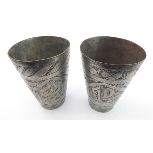 79 - A pair of Safavid-style heavy goblets; enamelled and decorated with a central band of inverting pear... 