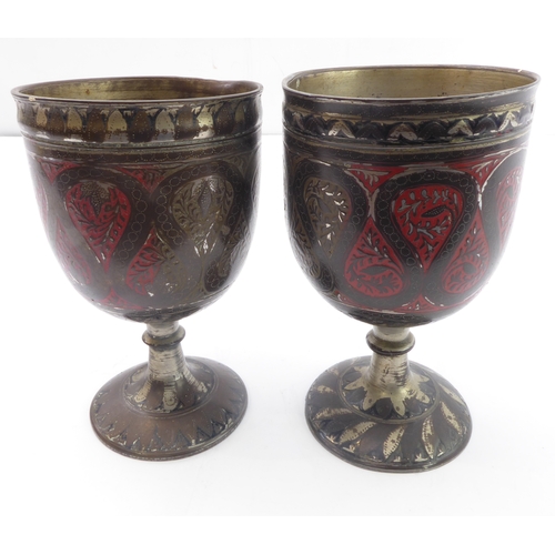 79 - A pair of Safavid-style heavy goblets; enamelled and decorated with a central band of inverting pear... 