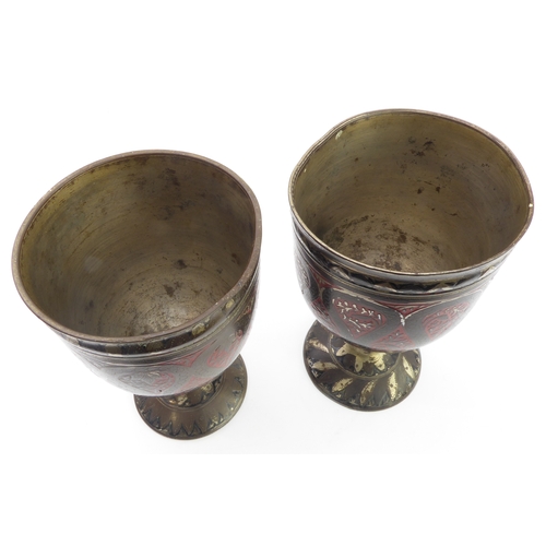 79 - A pair of Safavid-style heavy goblets; enamelled and decorated with a central band of inverting pear... 