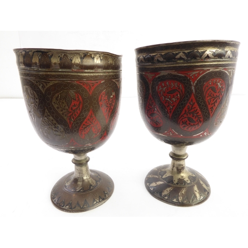 79 - A pair of Safavid-style heavy goblets; enamelled and decorated with a central band of inverting pear... 