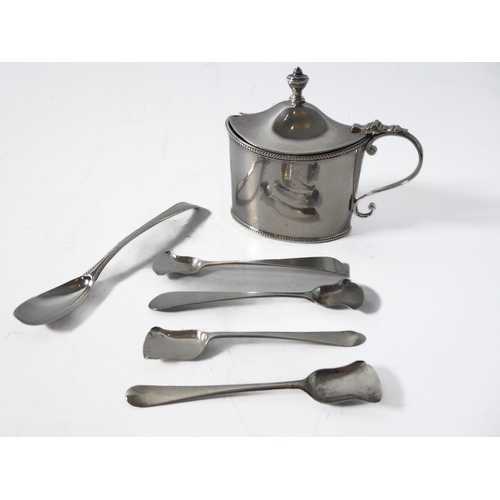 87 - A large hallmarked silver mustard of oval form and with heavy cobalt blue glass liner, maker's mark ... 