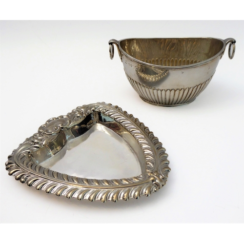 112 - Silverware comprising a heart-shaped trinket dish with raised repoussé-style foliate border and vaca... 