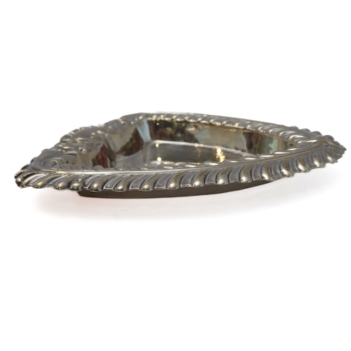 112 - Silverware comprising a heart-shaped trinket dish with raised repoussé-style foliate border and vaca... 