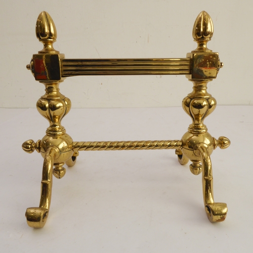 75 - A pair of late 19th century cast and wrought brass andirons (27.5cm wide)